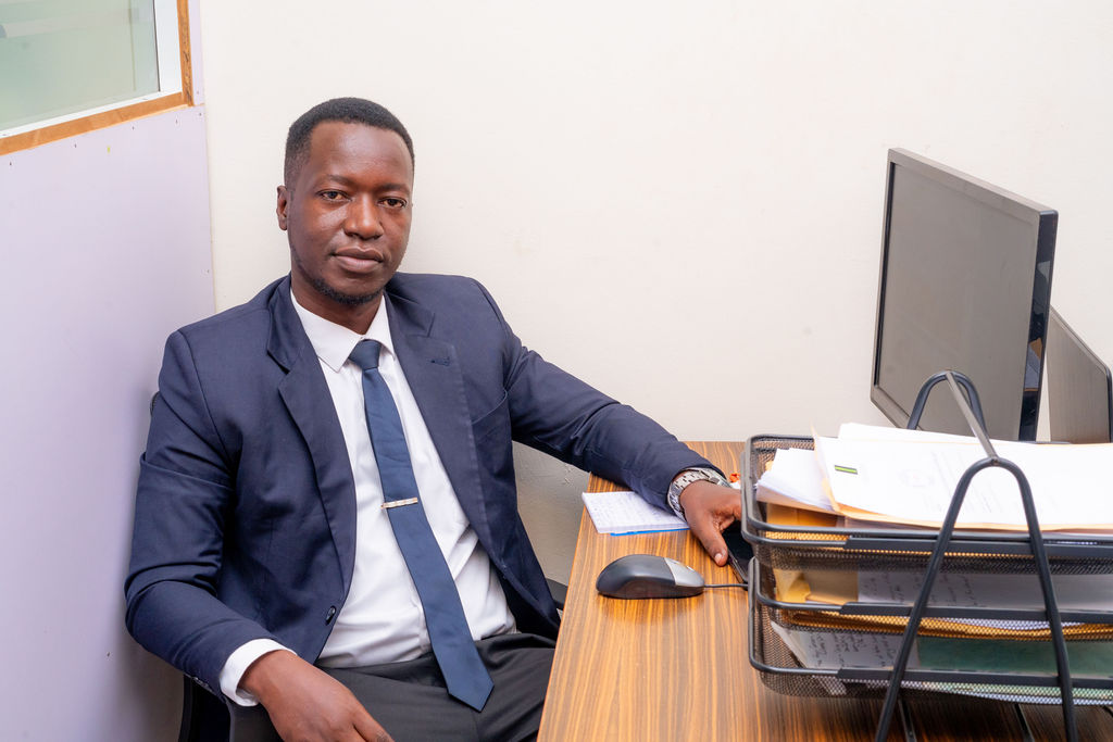 Timothy Olinga, Legal Clerk